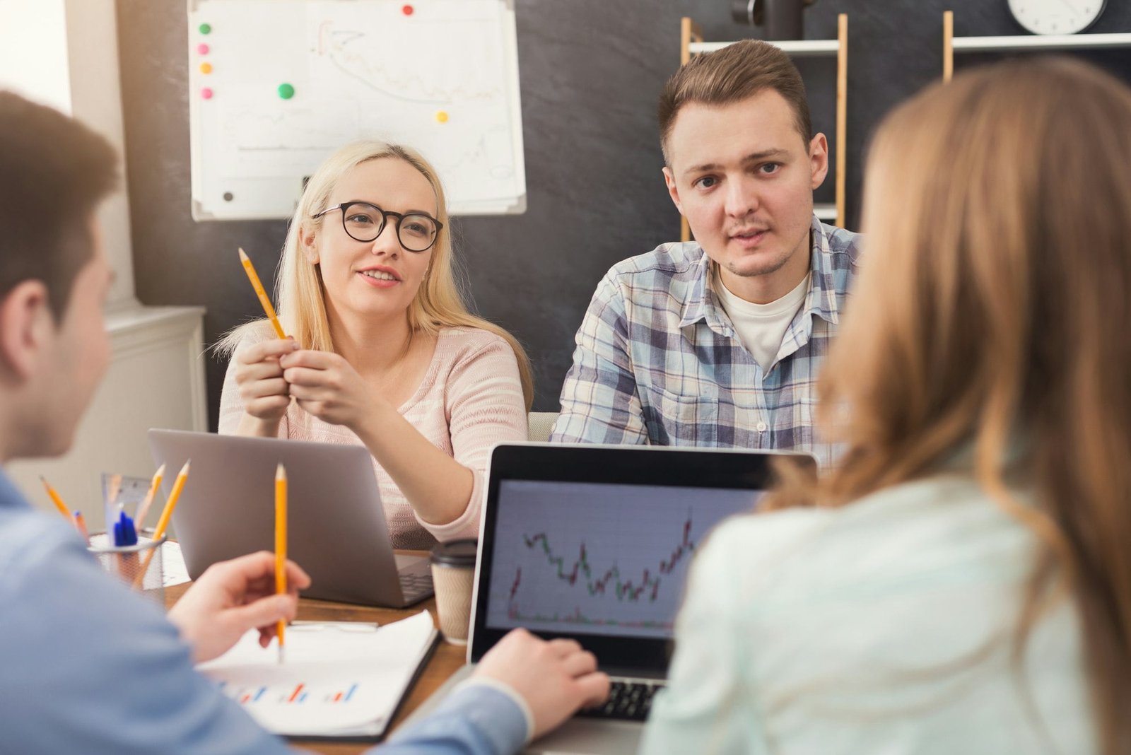 Business team discussing results of their work